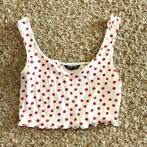 Cute cropped tank top with an adorable strawberry pattern!